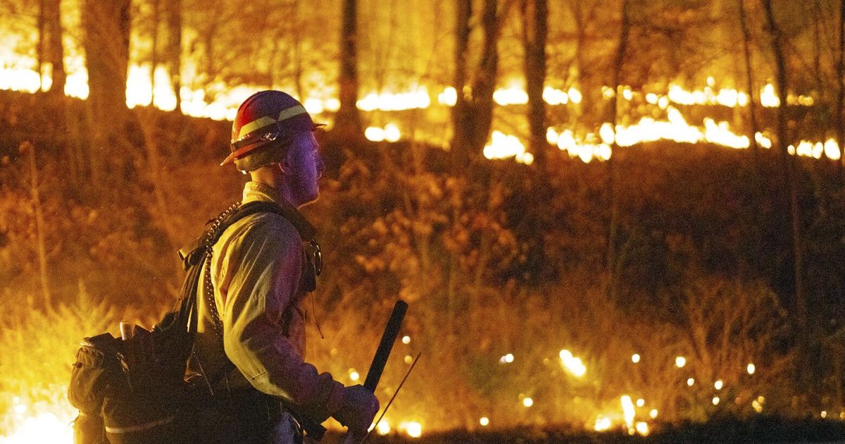 Dozens of fires still burn in US Northeast but California fire is under relative control