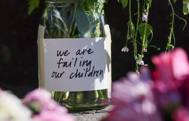 The memorial for Amarr Murphy continues to grow Friday afternoon at Garfield High School in Seattle, Washington, on June 7, 2024. Murphy was shot and killed Thursday in front of the Quincy Jones Performance Center. 227155 227155