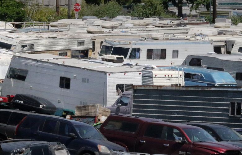 About 40 impounded RVs are stored in Lincoln Towing North Aurora lot awaiting auctions, demolition or (least likely) returned to owners after towing and fees paid.
Lincoln is the city’s towing contractor.   This year’s one-night homeless count found more than 800 RV’s on the streets.

Chuck Labertew, manager of Lincoln Towing on North Aurora.

RV storage, etc.

Tuesday July 2 2019

car ranchers, people who buy junk cars, trucks and RVs at auction and rent them out to homeless people

 210684