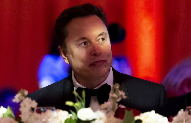Elon Musk watches before President-elect Donald Trump speaks during an America First Policy Institute gala at his Mar-a-Lago estate, Thursday, Nov. 14, 2024, in Palm Beach, Fla. (AP Photo/Alex Brandon) OTKAB OTKAB