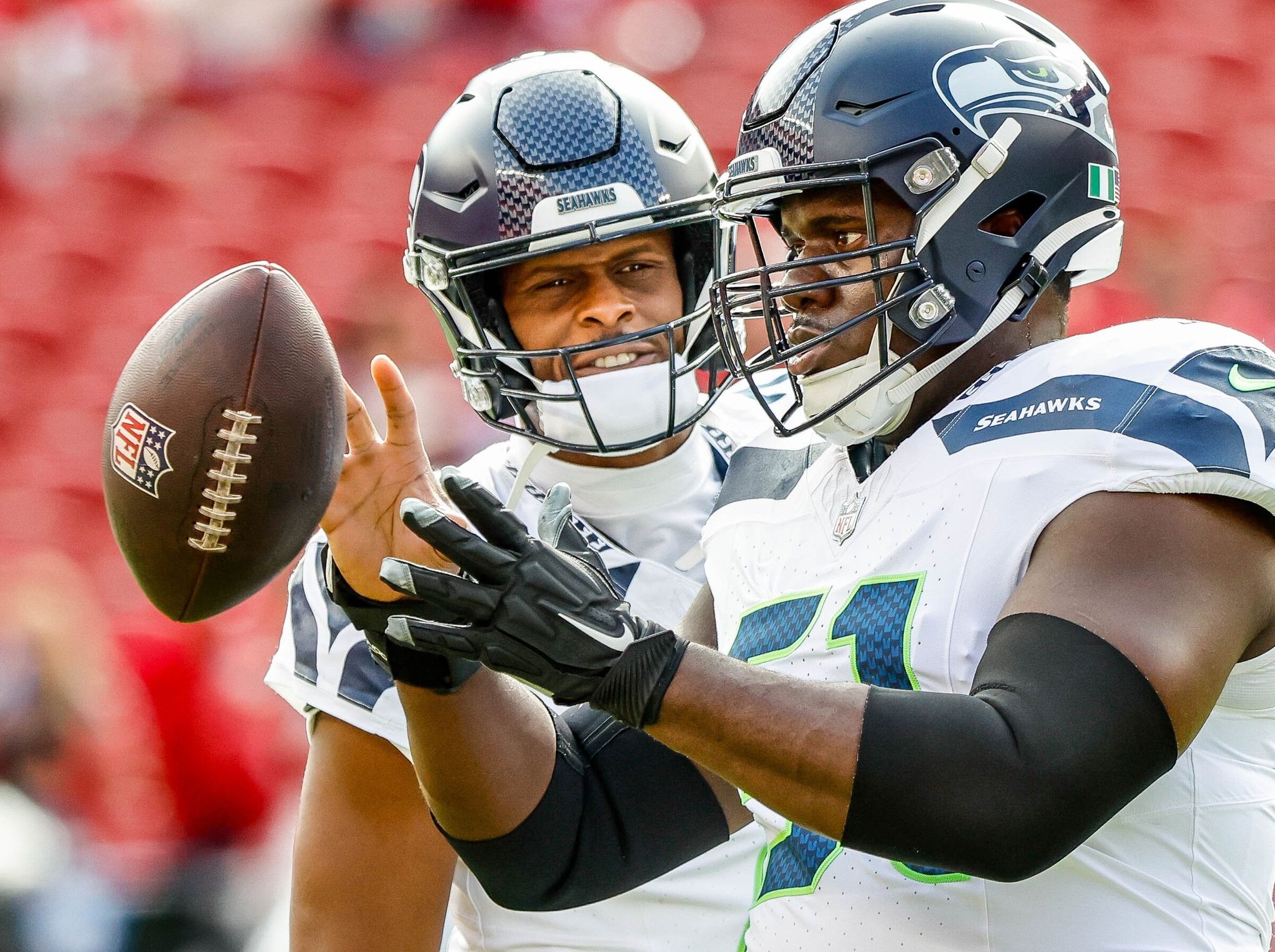 Seahawks' new center Olu Oluwatimi proves up to task | Notebook | The Seattle Times