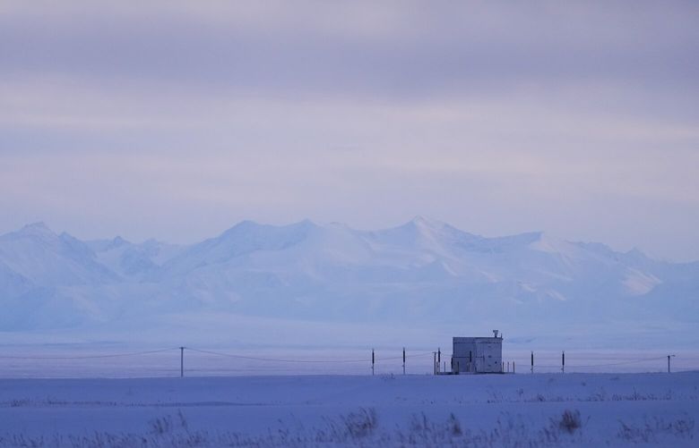The Brooks Range mountains of the Arctic National Wildlife Refuge are seen in the distance at the edge of the village Monday, Oct. 14, 2024, in Kaktovik, Alaska. (AP Photo/Lindsey Wasson) AKLW818 AKLW818