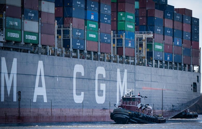 A tugboat and the container ship CMA CGM Marco Polo arrive at the Packer Avenue Marine Terminal in Philadelphia in March 2024. (Jessica Griffin/The Philadelphia Inquirer/TNS) 127034587W 127034587W