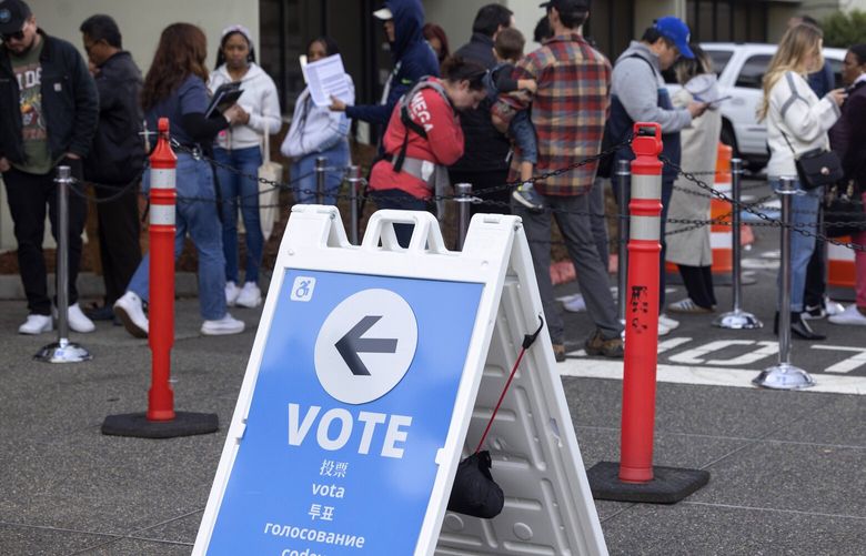People gathert outside of King County Elections headquarters in Renton so they can either register to vote, turn in their ballots, or resolve any other concerns regarding voting Tuesday, November 5, 2024.
An official at the headquarters said they predicted that  82% percent of registered voters would cast their ballots. 228438