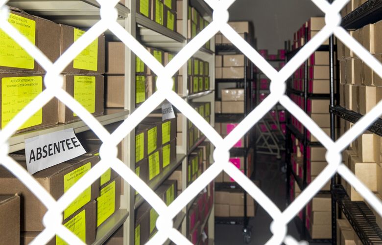 Ballots from the 2024 election, stored behind locked fencing at the Ada County Elections Office in Boise, Idaho, Nov. 20, 2024. After enduring a host of election conspiracy claims in recent years, a county in Idaho believes it has found a way to restore confidence in the vote-counting system. (Natalie Behring/The New York Times) XNYT0242 XNYT0242
