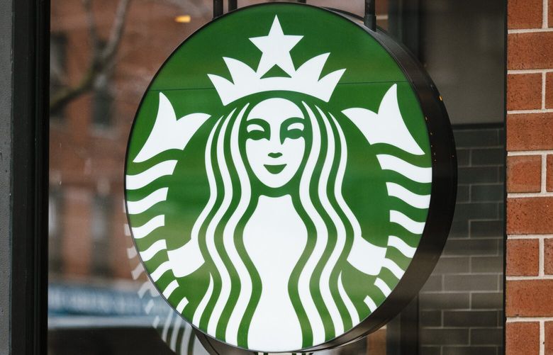 Starbucks cafe signage on Jan. 29, 2024. (Angus Mordant / Bloomberg)
