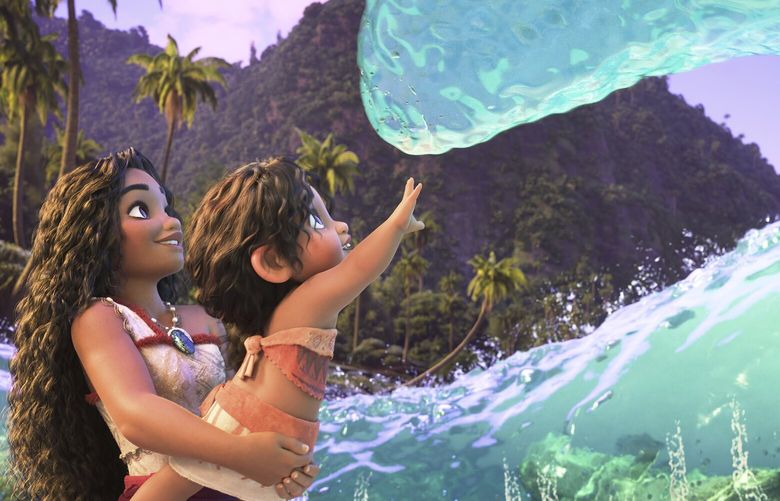 This image released by Disney shows the characters Moana, voiced by Auli’i Cravalho, holding Simea, voiced by Khaleesi Lambert-Tsuda, in a scene from “Moana 2.” (Disney via AP) NYET770 NYET770