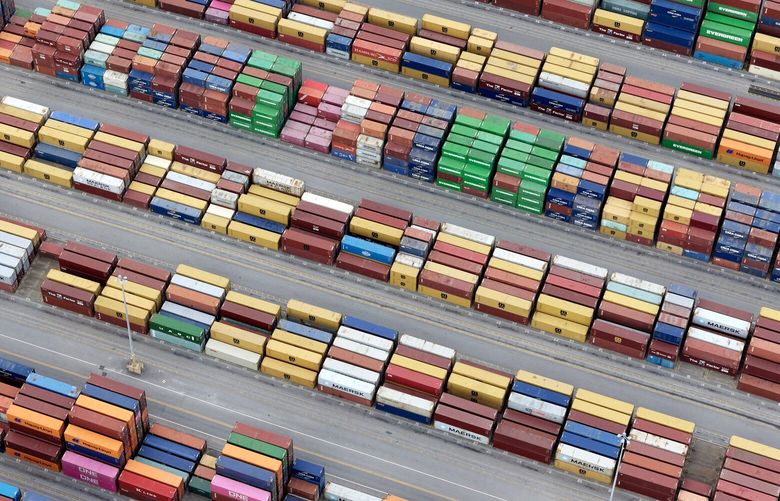 FILE — Containers at the Port of Georgia, along the Savannah River, on Garden City, Ga., Oct. 1, 2024. President-elect Donald Trump said that he would impose the tariff on Day 1 and that it would stay in place until Canada and Mexico halted the flow of drugs and migrants across U.S. borders. (Adam Kuehl/The New York Times) XNYT0473 XNYT0473