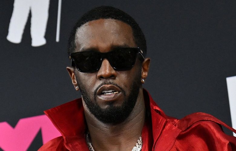 Producer-musician Sean “Diddy” Combs poses with the Global Icon award in the press room during the MTV Video Music Awards at the Prudential Center in Newark, New Jersey, on Sept. 12, 2023. (Angela Weiss/AFP via Getty Images/TNS) 127627649W 127627649W