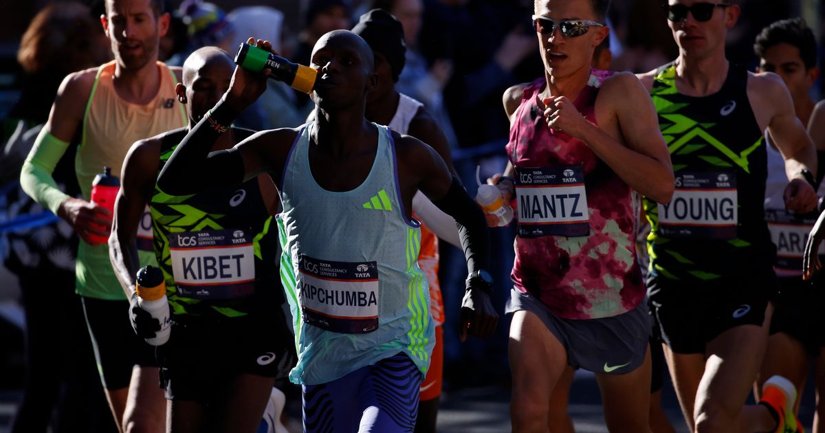 Abdi Nageeye of the Netherlands and Sheila Chepkirui of Kenya win the