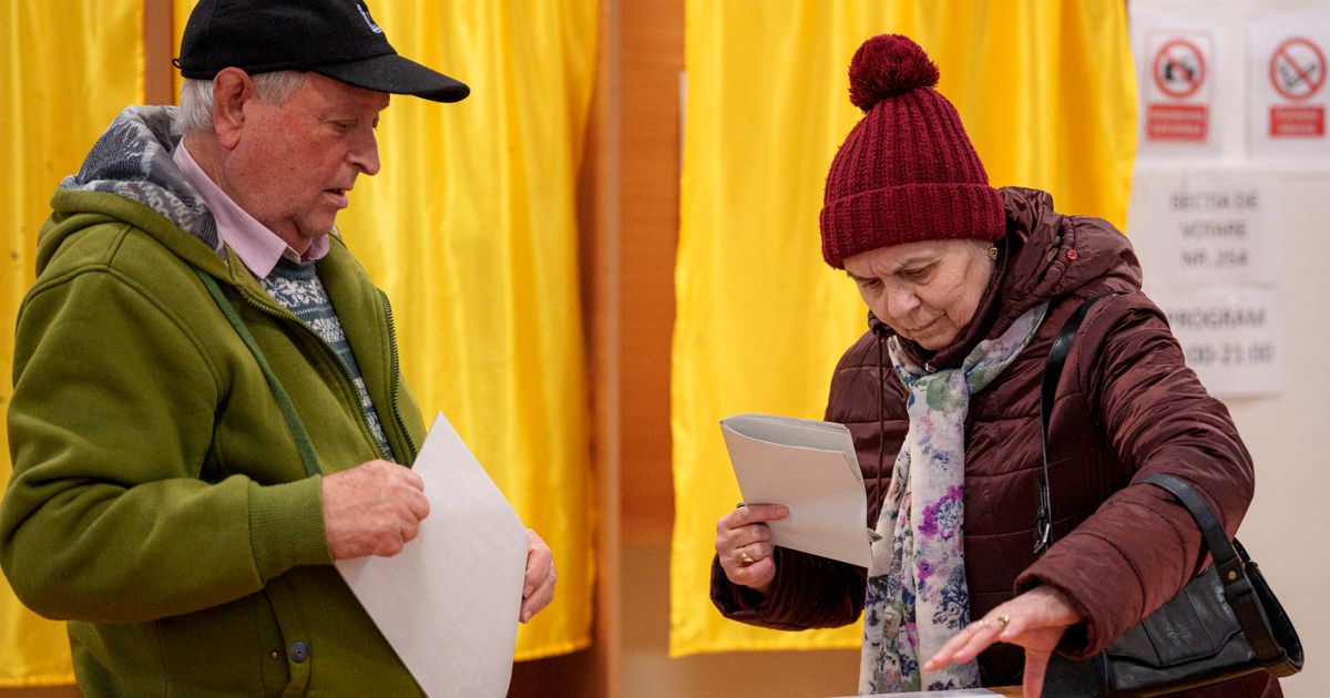 Romanians cast ballots in parliamentary election as turmoil in presidential race grips the nation 