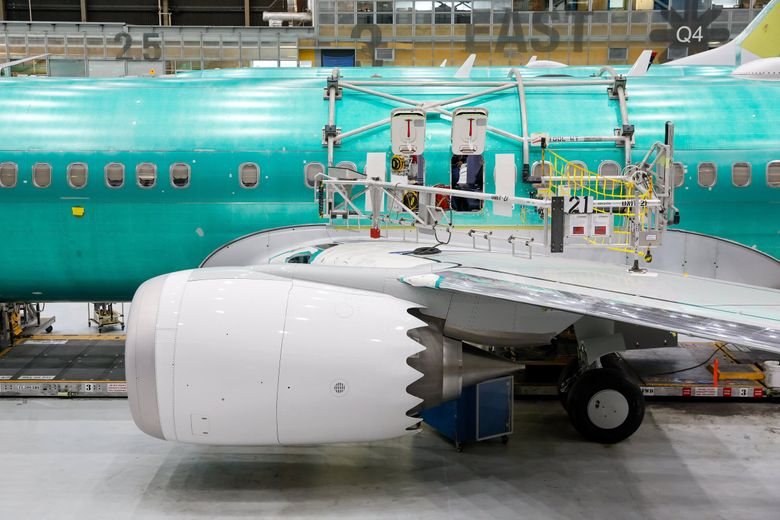 737 MAX aircraft are seen at the Boeing 737 factory on June 25 in Renton. (Jennifer Buchanan / The Seattle Times)