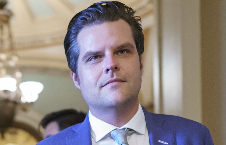 Rep. Marjorie Taylor Greene, R-Ga., left, and Rep. Matt Gaetz, R-Fla., return to the House after walking to the Senate chamber with other conservatives, to express their opposition to new mask guidance, at the Capitol in Washington, Thursday, July 29, 2021. Earlier in the day, House Minority Leader Kevin McCarthy, R-Calif., charged that the Centers for Disease Control has become a political arm of the administration. (AP Photo/J. Scott Applewhite) DCSA119 DCSA119