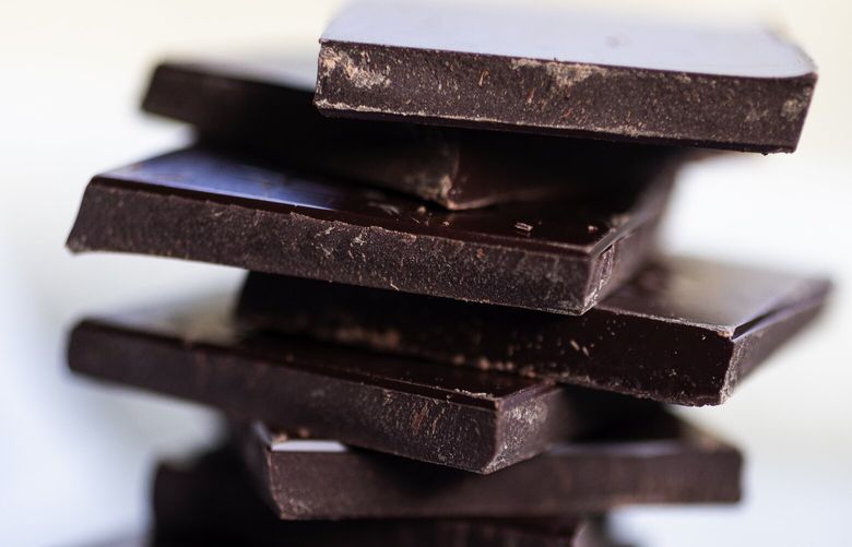 Research puts a spotlight on both Theo Organic Extra Dark Pure Dark Chocolate 85% Cocoa, and Organic Pure Dark 70% Cocoa as having potentially unsafe levels of lead and cadmium, Wednesday, Feb. 8, 2023, in Seattle. Pictured are a mix of the two different bars.