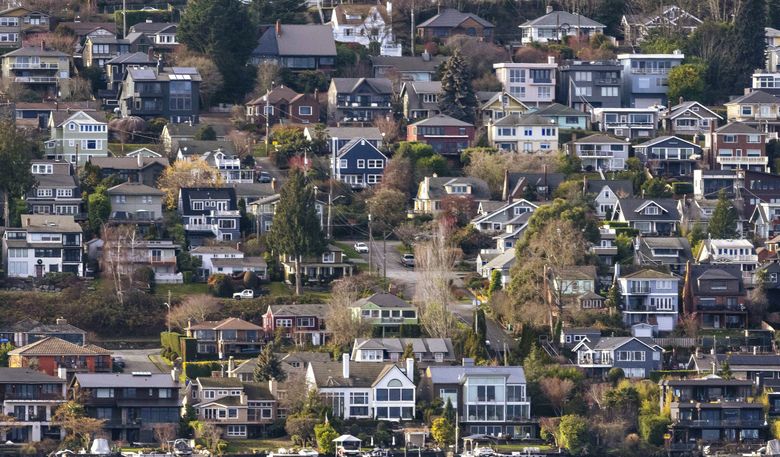 Houses overlook Lake Washington from Seattle’s Leschi neighborhood toward Bellevue.  (Ellen M. Banner / The Seattle Times)