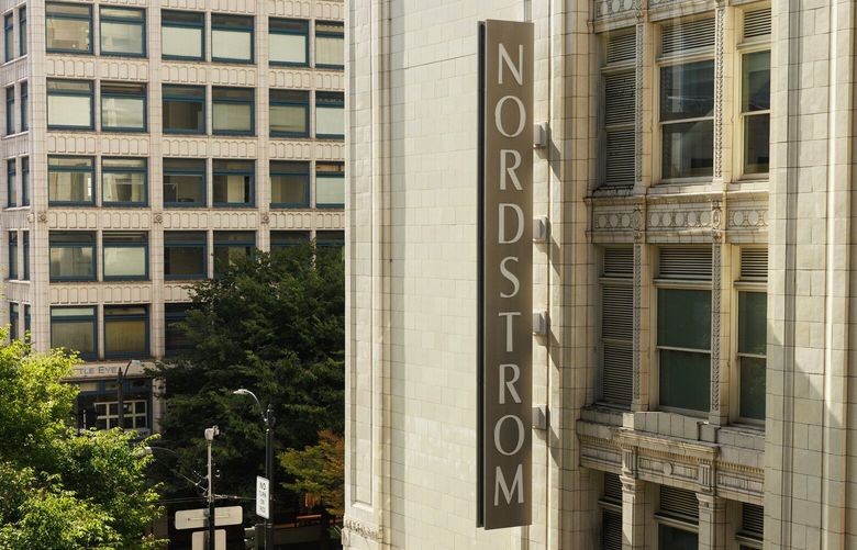 Pedestrians walk past Nordstrom in downtown Seattle Wednesday, Sept. 4, 2024.  227937