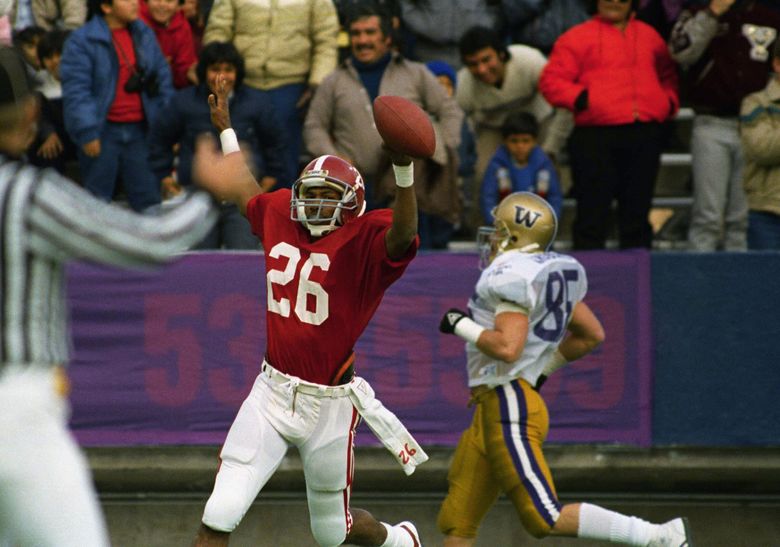 Bobby Humphrey runs a 60 plus yard touchdown into the end zone to score against Washington during the first quarter of the Sun Bowl in El Paso, Dec. 25, 1986. (David Breslauer / The Associated Press)