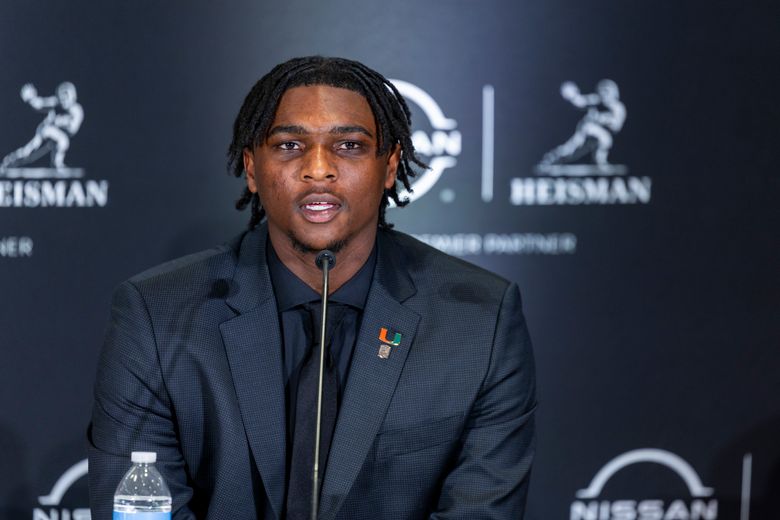 Miami's Cam Ward sets NCAA's Division I record with 156th career touchdown pass | The Seattle Times