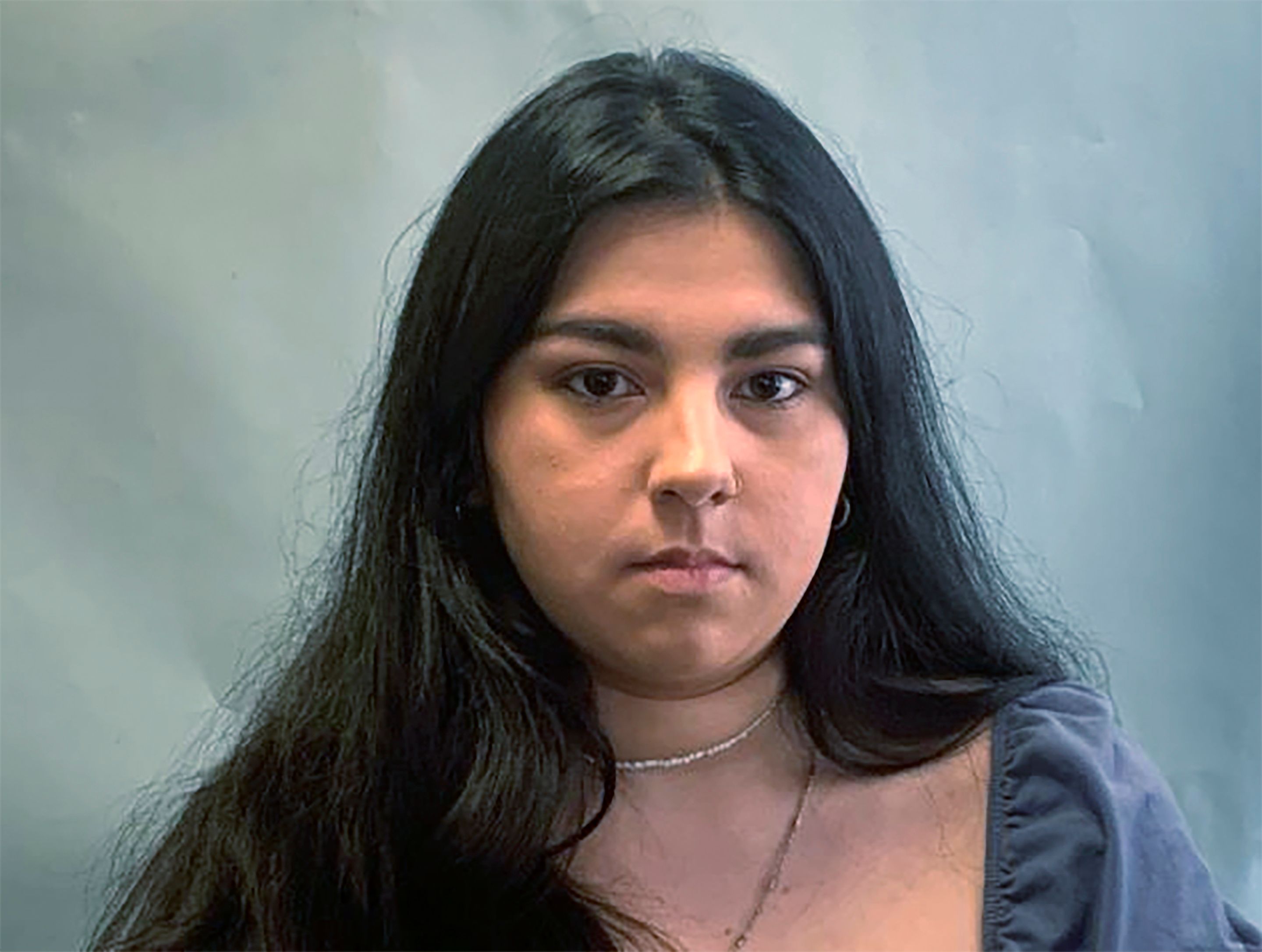 Michigan court upholds light sentence for woman who killed dad in
