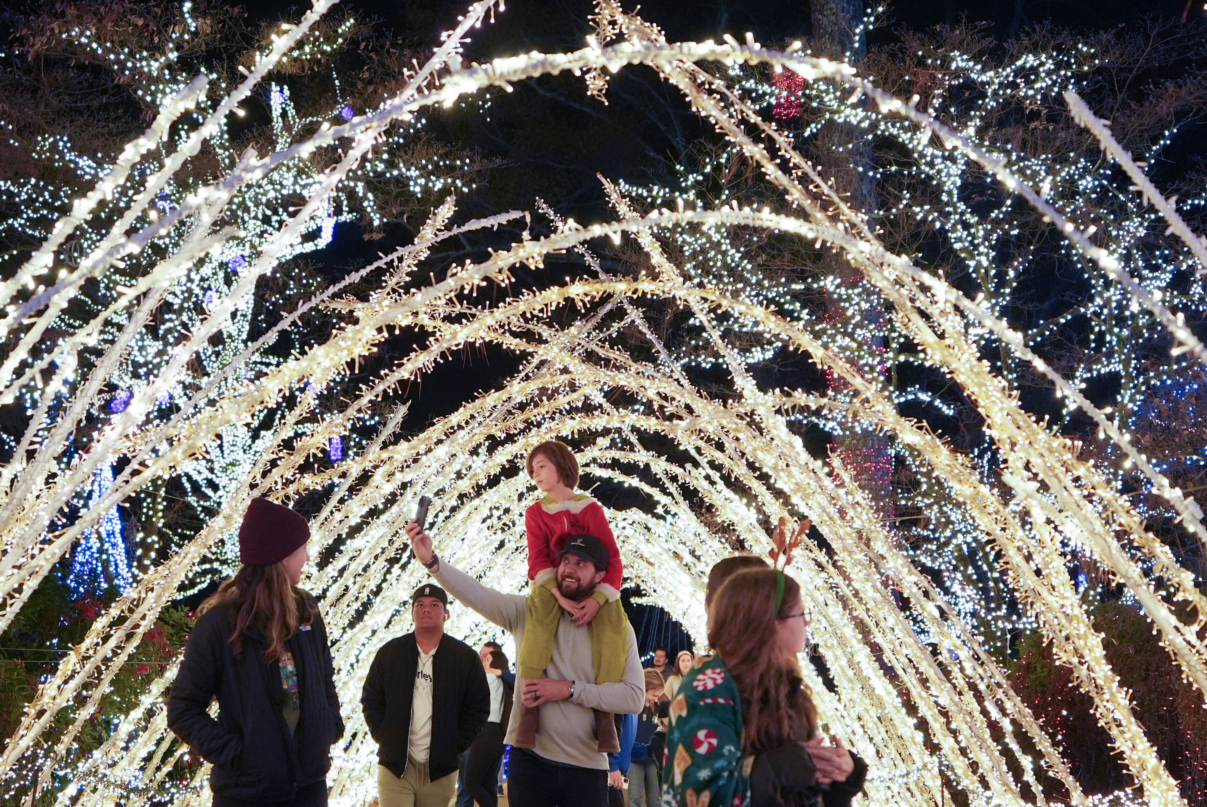 Elaborate holiday light displays are making spirits bright in a