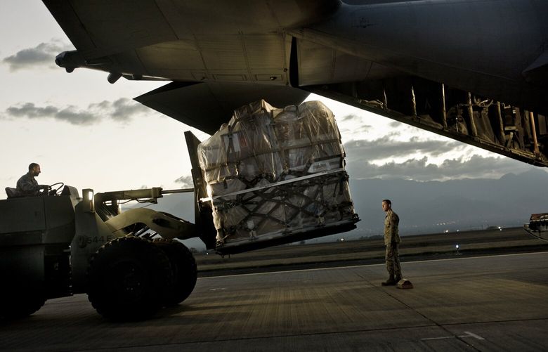 FILE — A U.S. Air Force plane is loaded at Soto Cano Air Base, near Comayagua, Honduras, March 13, 2012. In an address that was broadcast on Wed., Jan. 1, 2024, Honduras’ President Xiomara Castro threatened to push the U.S. military out of a base in the Central American country if President-elect Donald Trump carries out mass deportations of undocumented immigrants in the U.S. (Tomas Munita/The New York Times) XNYT0156