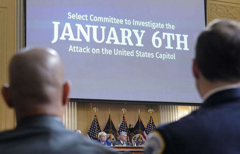 FILE – U.S. Capitol Police Sgt. Aquilino Gonell, left, and Washington Metropolitan Police Department officer Daniel Hodges listen as the House select committee investigating the Jan. 6 attack on the U.S. Capitol holds a hearing on Capitol Hill in Washington, Oct. 13, 2022. (AP Photo/Jacquelyn Martin, File) WX503 WX503
