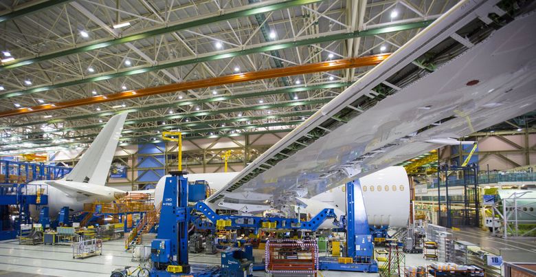 The wing and center fuselage sections are joined inside the Boeing 787 final assembly factory in Everett. (Mike Siegel / The Seattle Times, 2014)