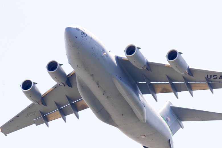 A C-17 Globemaster lll airlifter undergoes testing over the skies above Paine Field in Everett. (Mike Siegel / The Seattle Times, 2020)