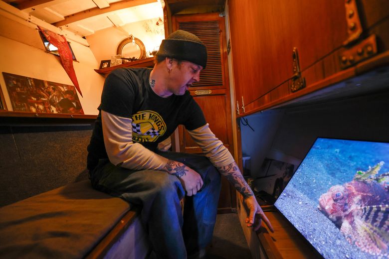 Ryan Currier customized his boat to make room for a large LCD screen. Because he’s a mechanic, he’s been able to fix and maintain his boat on his own, keeping costs low. (Karen Ducey / The Seattle Times)