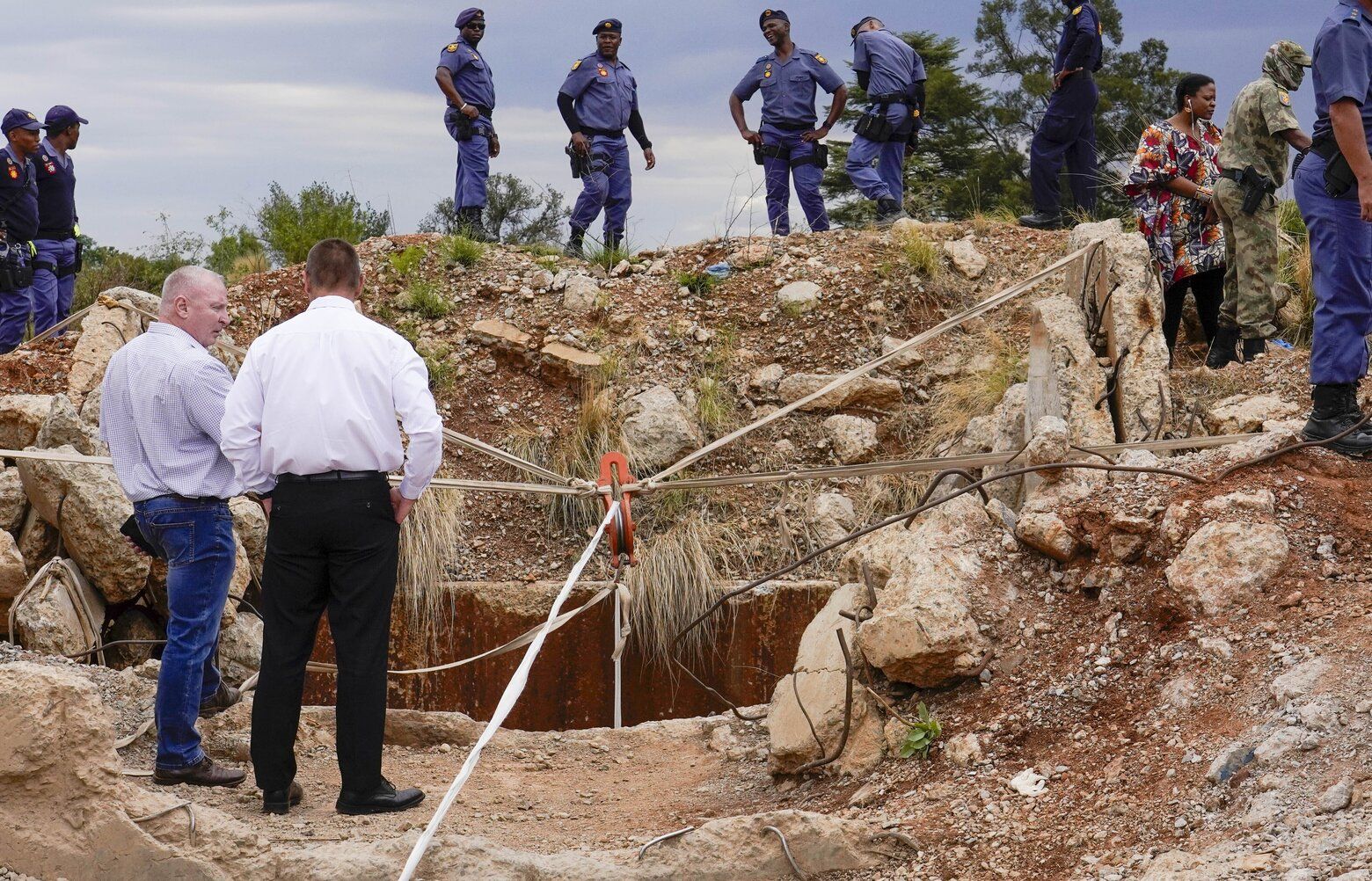 At least 100 illegal miners have died while trapped in a South African mine for months, group says