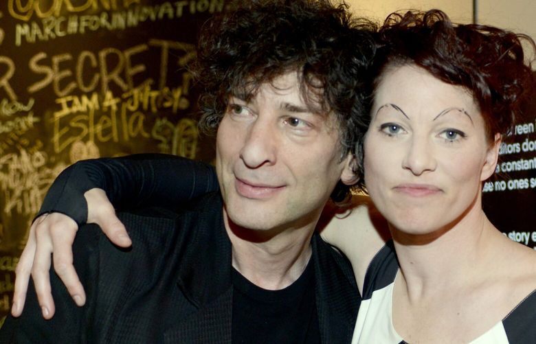 Neil Gaiman and Amanda Palmer pose at the Warner Brothers TV 2013 SXSW party on March 9, 2013, in Austin, Texas. (Tim Mosenfelder/Getty Images/TNS) 132115407W 132115407W