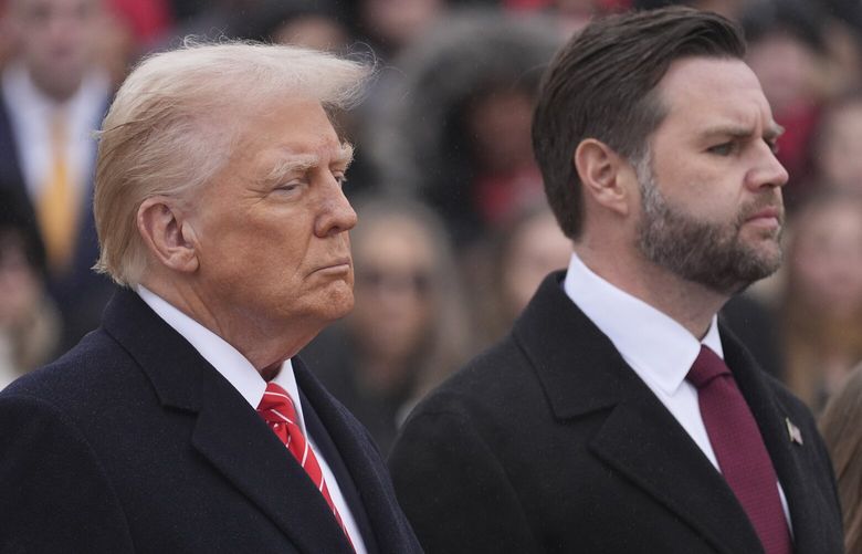 President-elect Donald Trump and Vice President-elect JD Vance participate in a wreath laying ceremony at the Tomb of the Unknown Solider at Arlington National Cemetery, Sunday, Jan. 19, 2025, in Arlington, Va. (AP Photo/Evan Vucci) VAJE369 VAJE369
