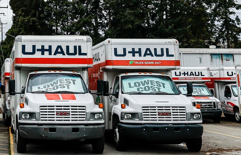 Vans await renting Friday afternoon the U-Haul rental store on Aurora Ave in Shoreline, Washington on March 24, 2023.