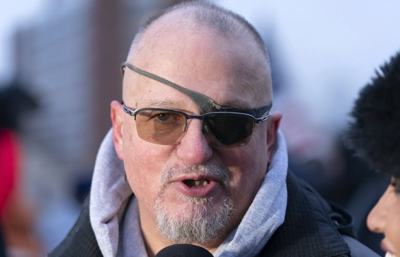 President Donald Trump supporter Oath Keepers founder Stewart Rhodes convicted on charges relating to the Jan. 6 riot at the U.S. Capitol, talks to reporters outside the DC Central Detention Facility, after being released from a jail in Maryland, in Washington, Tuesday, Jan. 21, 2025. (AP Photo/Jose Luis Magana) DCJL139 DCJL139