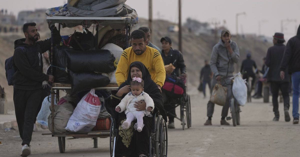 Middle East latest: Palestinians return to their homes in northern Gaza for a second day