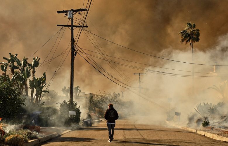 FILE – A residential neighborhood on fire in the Pacific Palisades area of Los Angeles, Jan. 7, 2025. From the beginning, there had been warnings that this winter day would not be typical for Southern California, where it often rains in January. (Philip Cheung/The New York Times) XNYT0681 XNYT0681