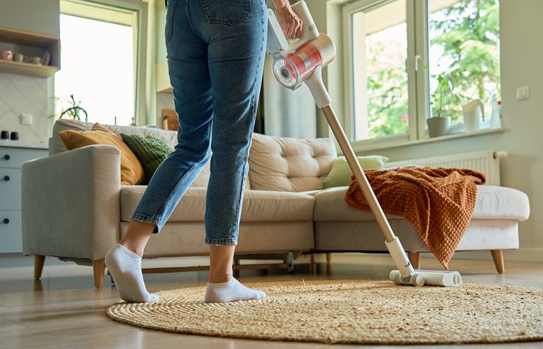 Vacuum the top of the rug once or twice a week. Use gentle suction and disengage the beater bars so you don’t pull apart the weave. (Getty Images)