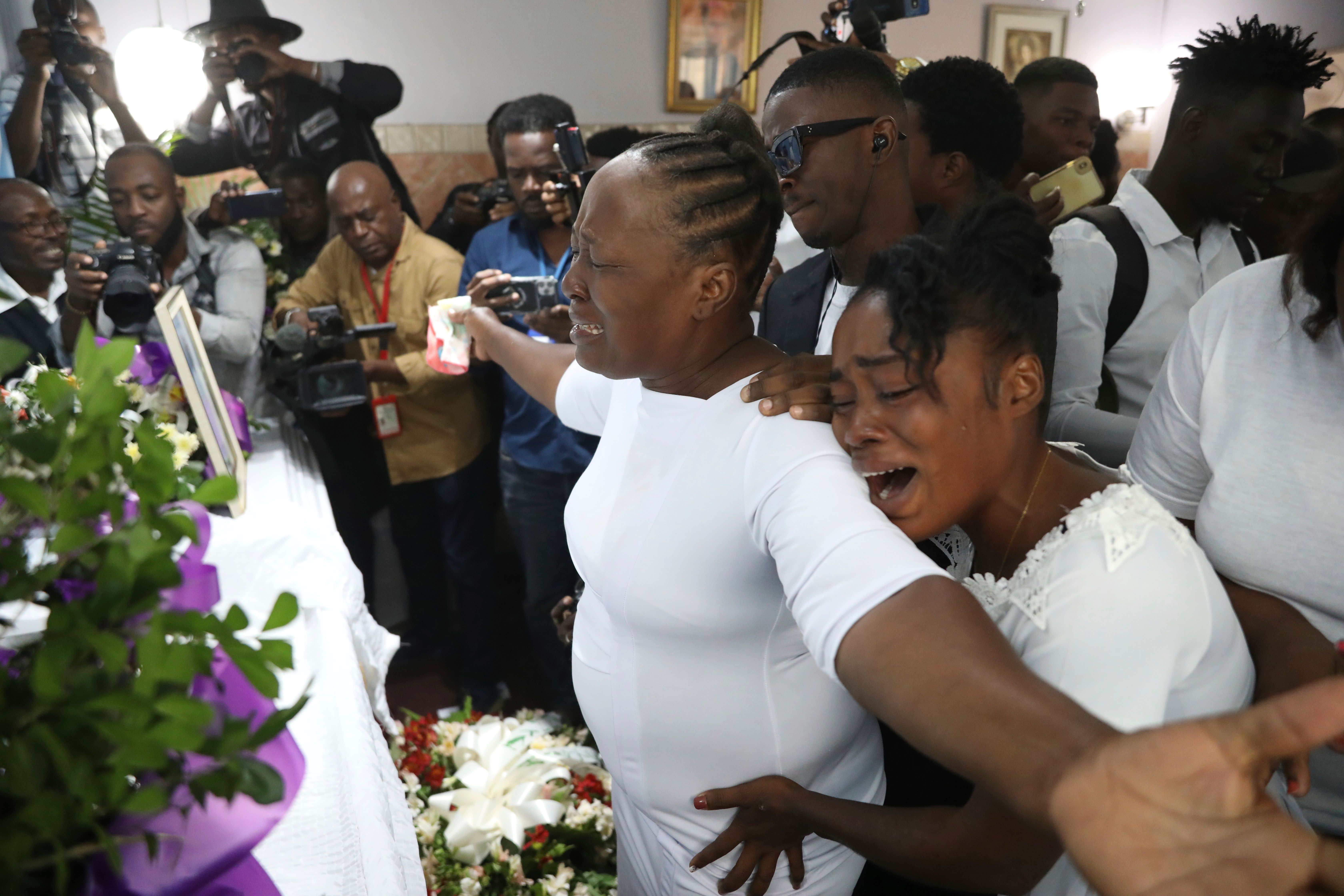 Journalists in Haiti demand justice as they bury a second colleague killed by gangs