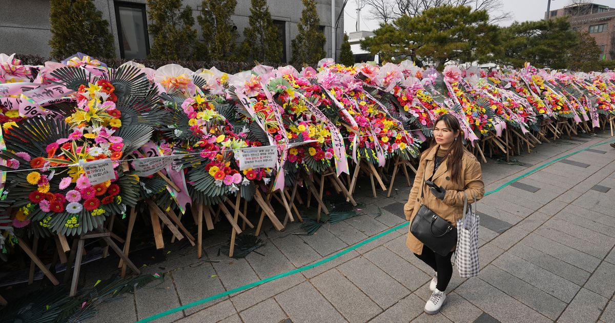 South Koreans turn funeral wreaths and K-pop light sticks into political protest tools