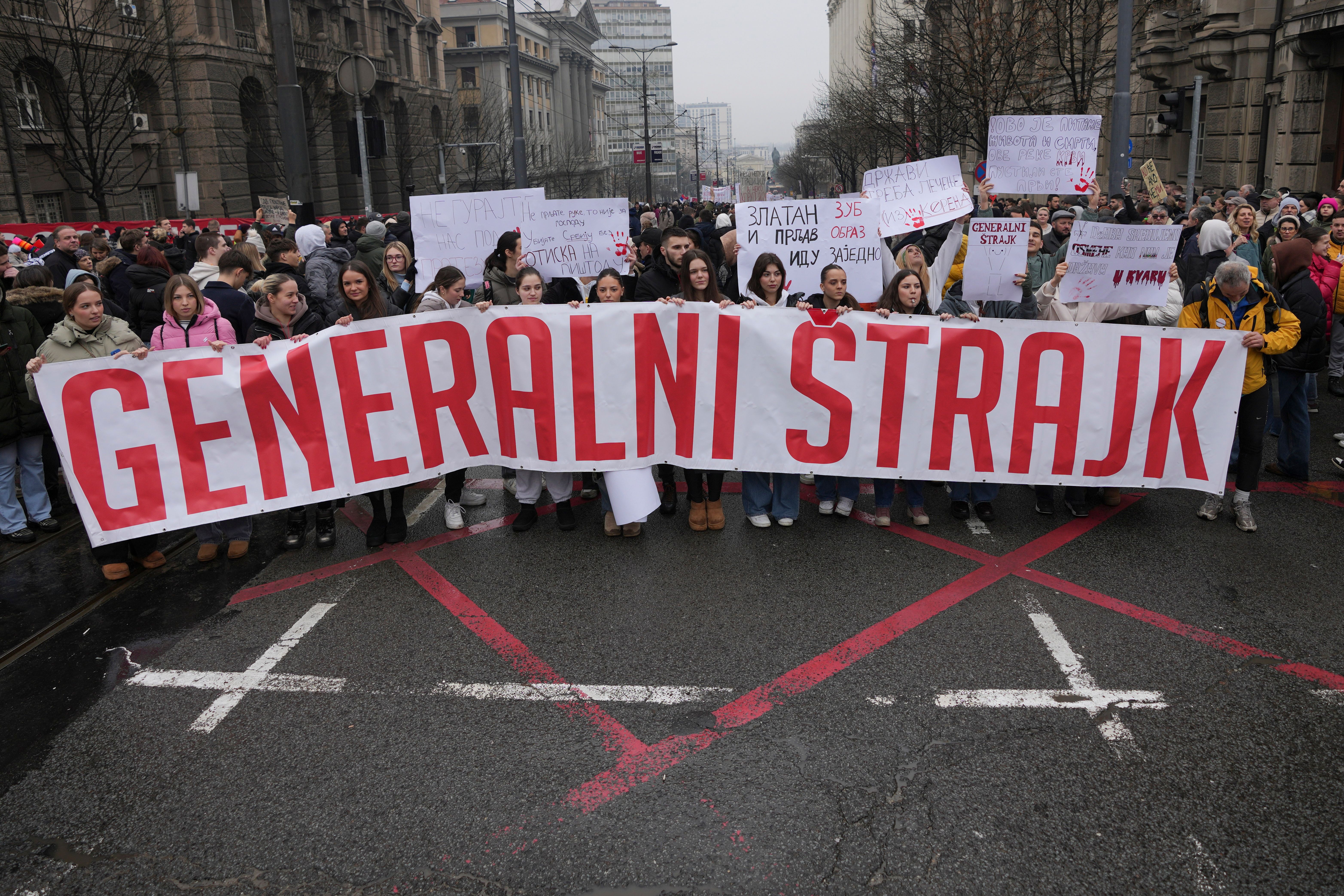 Driver rams an anti-government rally in Serbias capital and injures one protester