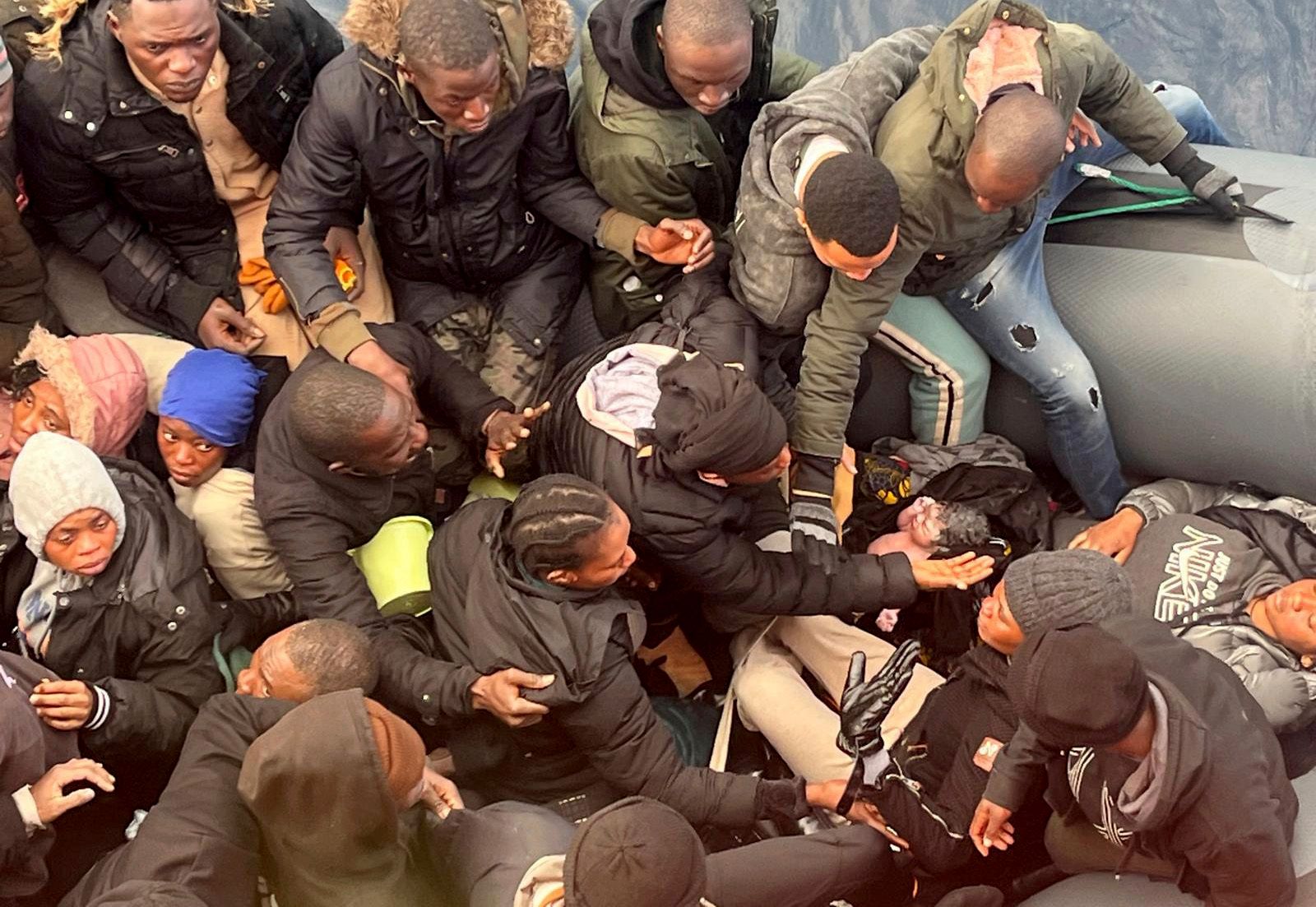 A photo captures rescue of a baby born on dangerous sea crossing to Spains Canary Islands