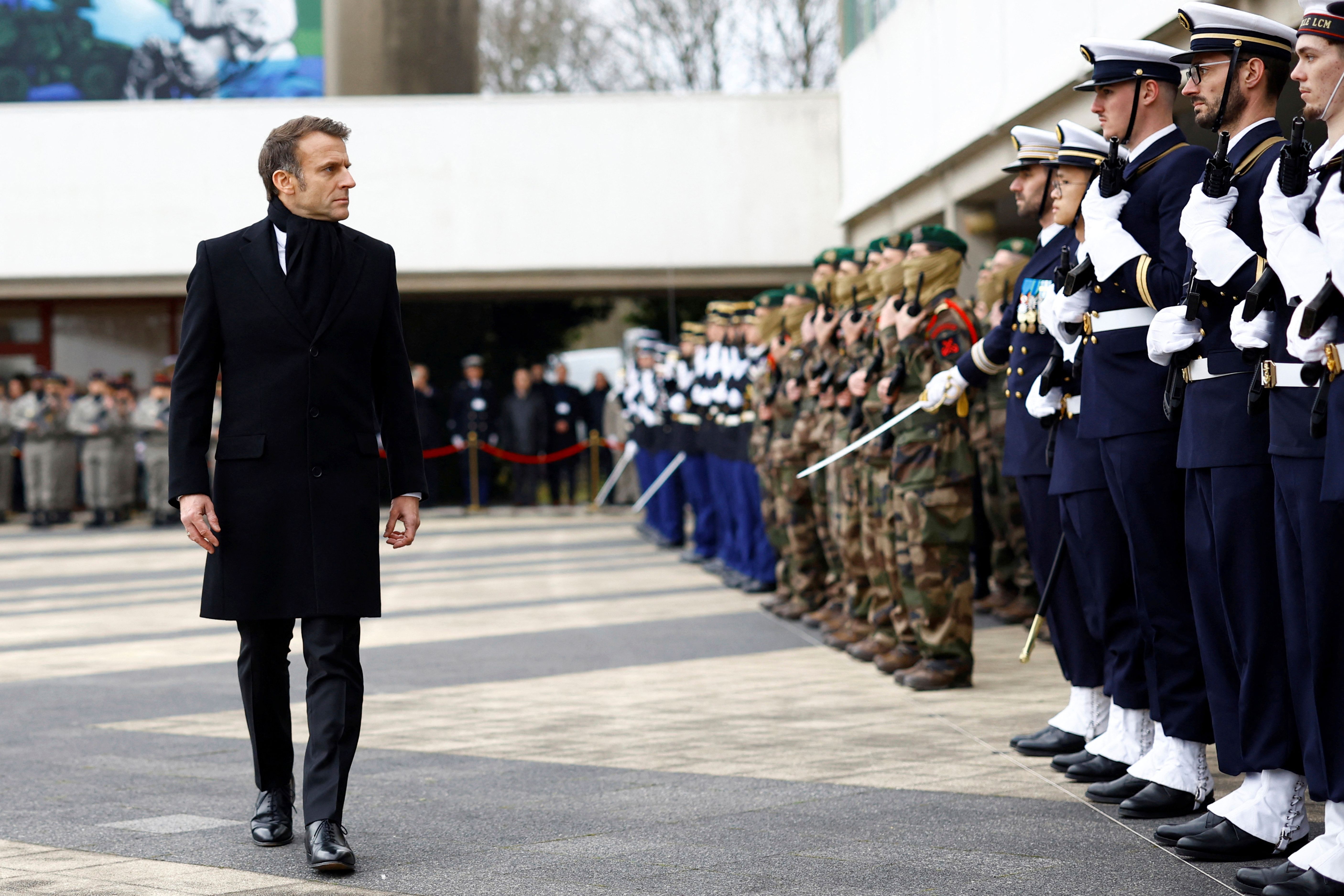 Wake up and spend more on defense, Macron tells Europe as Trump takes office