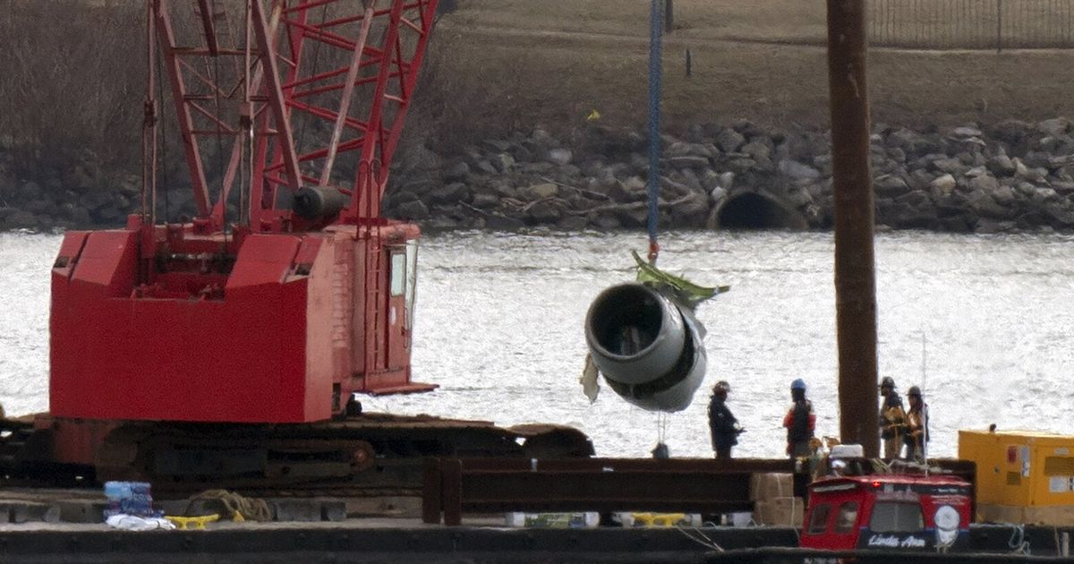 Salvage crews recover engine, large portion of jet from river after ...