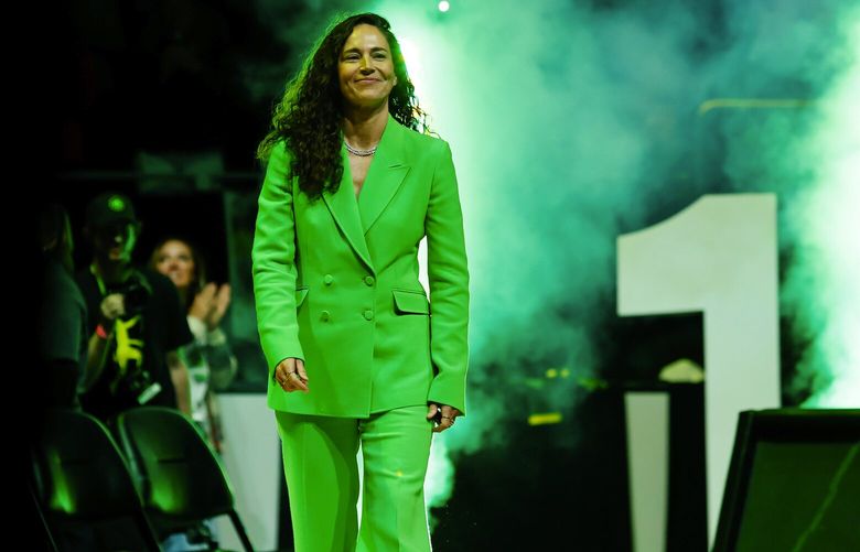 Former Storm player Sue Bird walks onto the court before the start of her jersey retirement ceremony.  224111 224111