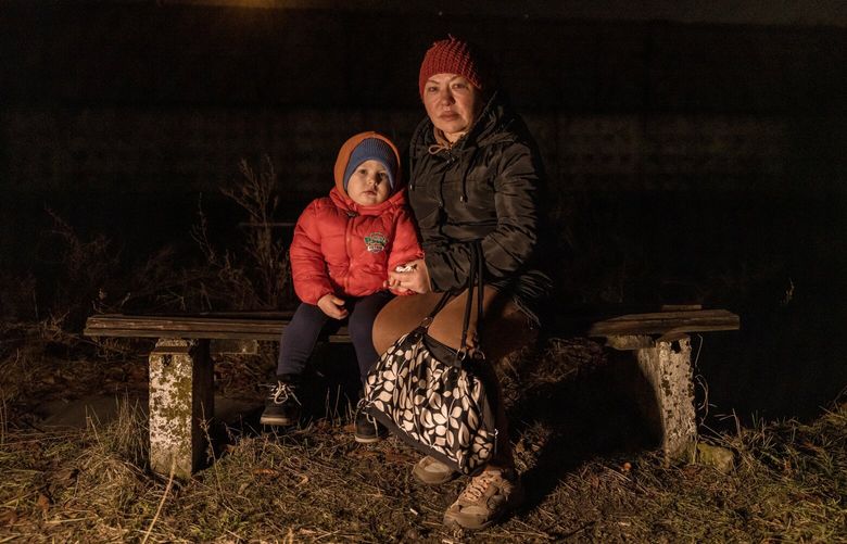 Svitlana Vakar and her grandson Maksym wait for a chance to visit the boy’s father, who was picked up for military conscription on his way to work, outside a recruitment center in Kyiv, Ukraine, Jan. 27, 2025. After three years of grinding war with Russia, the well of volunteers in Ukraine has run dry, and now men wait for their draft papers to arrive before appearing at recruiting centers, while the country’s military has been chasing draft dodgers. (Oksana Parafeniuk/The New York Times) XNYT0479 XNYT0479
