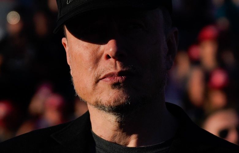 Elon Musk appears at a Trump campaign event at the Butler Farm Show in Pennsylvania on Oct. 5, just months after Trump was injured in Butler during an assassination attempt on July 13. MUST CREDIT: Jabin Botsford/The Washington Post