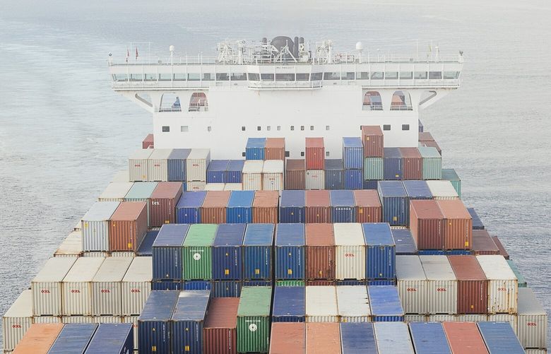 **EMBARGO: No electronic distribution, Web posting or street sales before 2:30 a.m. ET Tuesday, Jan. 22, 2019. No exceptions for any reasons. EMBARGO set by source.** A container ship crosses under the Lions Gate Bridge in Vancouver, British Colombia, Canada, Jan. 15, 2019. Increasing ship traffic, sonar and seismic air gun blasts now planned for offshore drilling may be disrupting migration, reproduction and even the chatter of the seas’ creatures. (Alana Paterson/The New York Times)