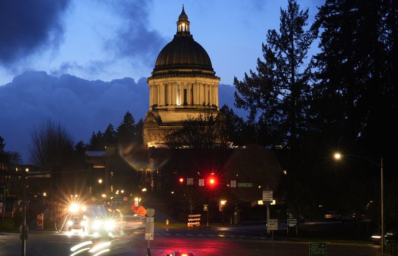 FILE – The Washington state Capitol building is pictured, Tuesday, Jan. 9, 2024, in Olympia, Wash. King County Superior Court Judge Michael Scott on Friday, June 21, 2024, has paused parts of a new Washington state parental rights law derided by critics as a “forced outing” measure. (AP Photo/Lindsey Wasson, File)