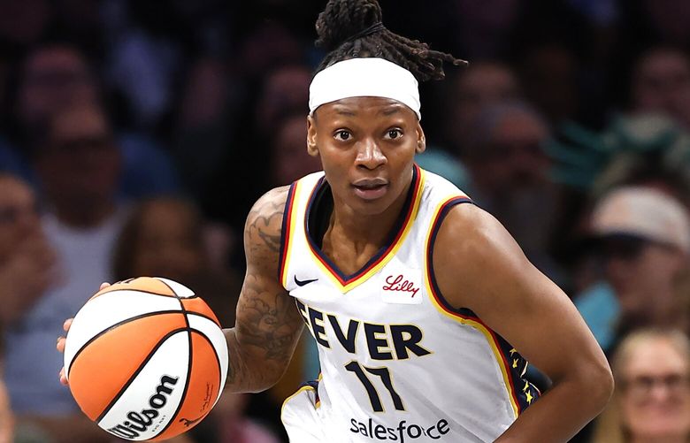 Indiana Fever guard Erica Wheeler (17) dribbles the ball against the New York Liberty during the first half of a WNBA basketball game, Saturday, May 18, 2024, in New York. (AP Photo/Noah K. Murray)