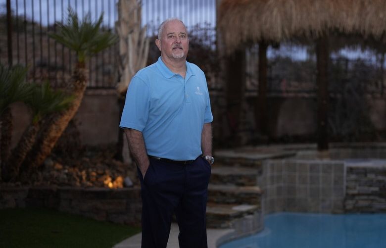 Darren Cobb poses for a photo at his home Thursday, Feb. 13, 2025, in Las Vegas. (AP Photo/John Locher) NVJL301 NVJL301